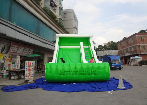 China Fogo - corrediça inflável comercial personalizada exterior retardadora do verde da corrediça da explosão fornecedor